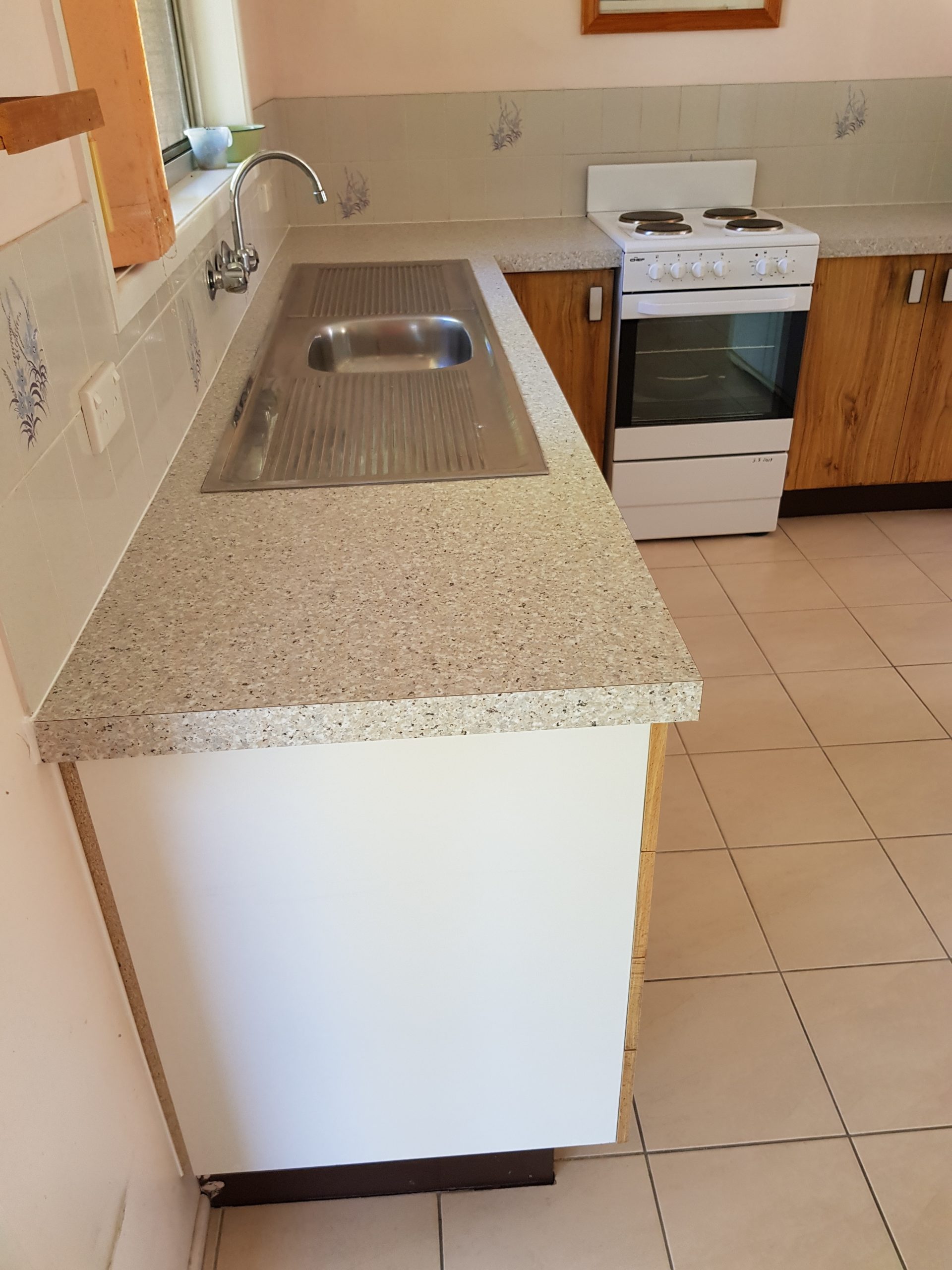 Laminate benchtop facelift for 80’s kitchen in Beachmere